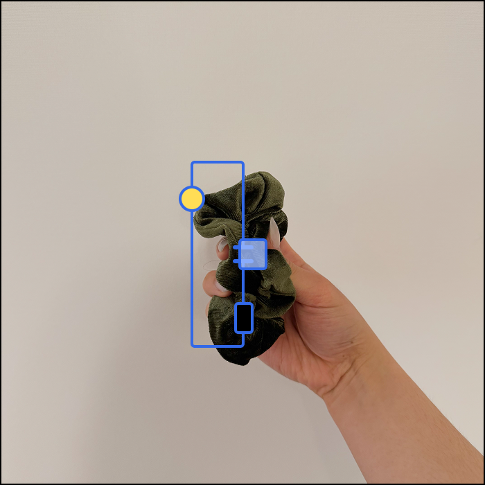 This is an example of an clothing based interaction, based on the scrunchie's elasticity, the switch is closed when the fabric is relaxed and pushed in.