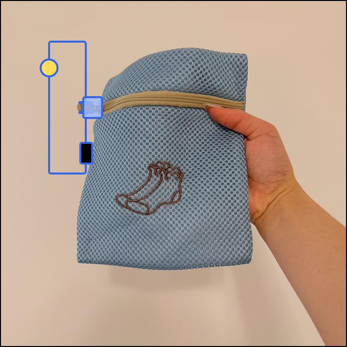 This is an example of an clothing based interaction, based on the zipper motion, the switch is closed when the zipper is zipped all the way closed.