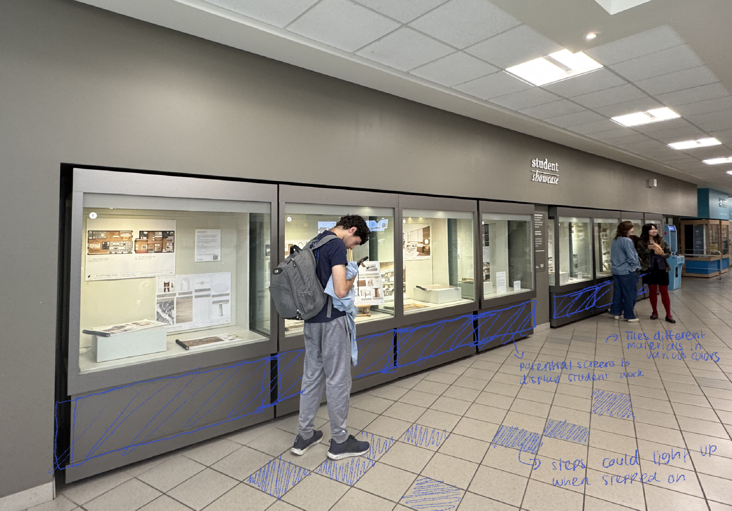 Sketch 3 of the projection mapping idea on chosen space. Utilizing the bottom part of the student showcase as potential space as well as tiles that light up.